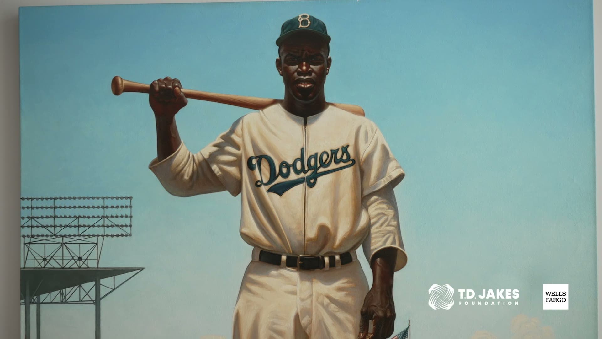 A Jackie Robinson Brooklyn Dodgers exhibit portrait inside the Jackie Robinson Museum, with the T.D. Jakes Foundation and Wells Fargo marks in the corner