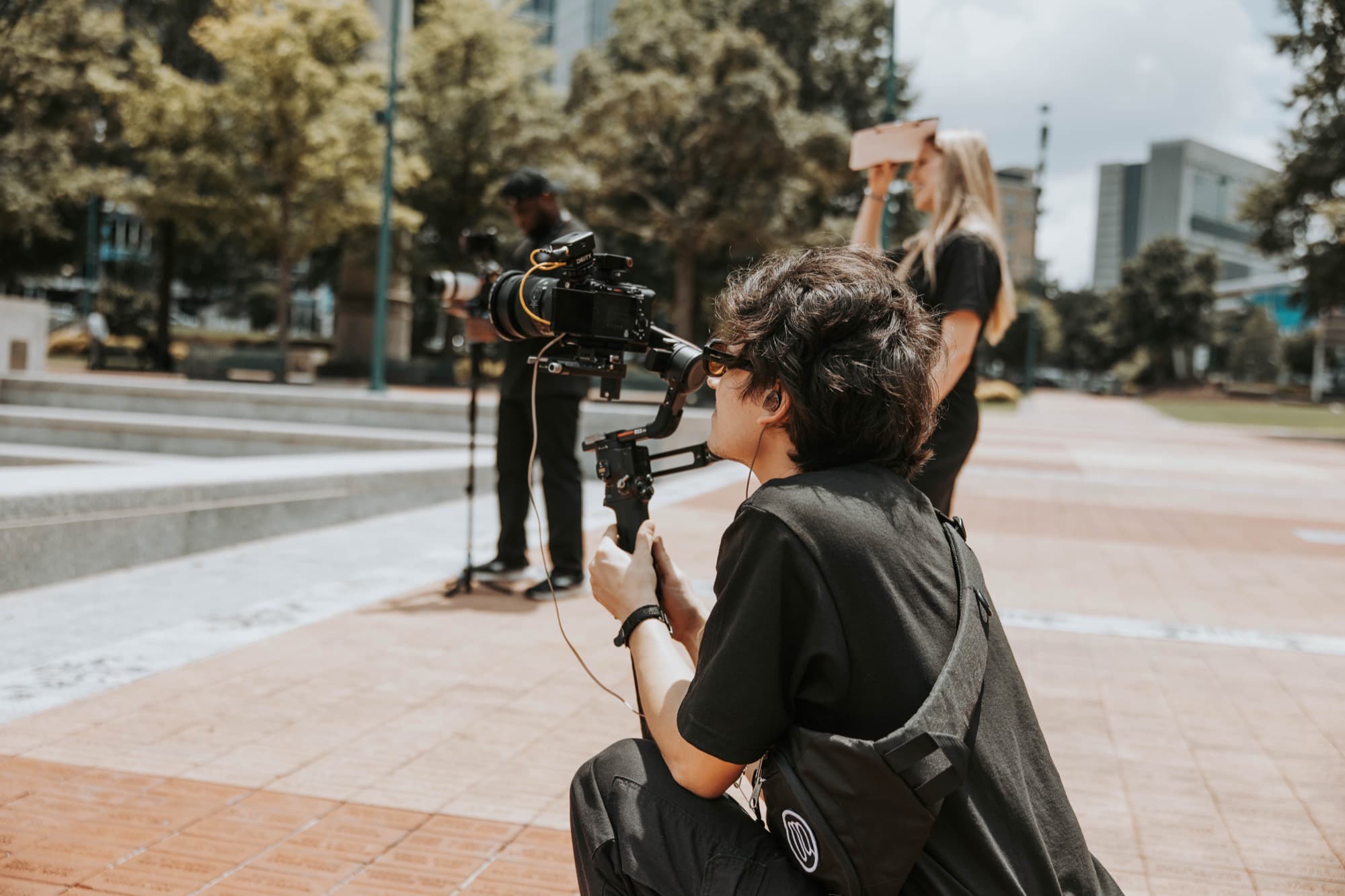 Griffith Media crew with gimbal camera rigs working on location